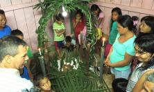 Photograph of villagers in Chimbota with their crib