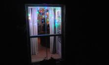 Festive lights through window