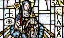 Photo of stained glass window of St Clare by Lawrence OP at flickr.com
